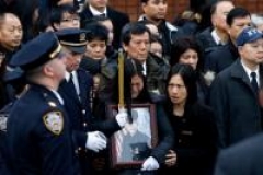 Hommage au second policier assassiné à New York
