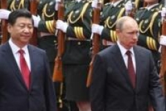 Poutine en quête de soutien en Chine face aux Occidentaux